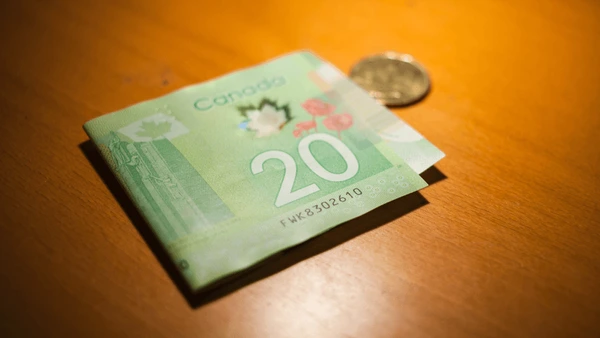 High-interest savings account concept with Canadian money