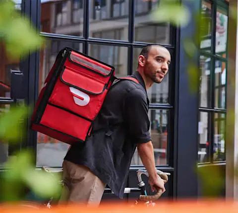 Gig worker earning extra income through delivery apps in Canada